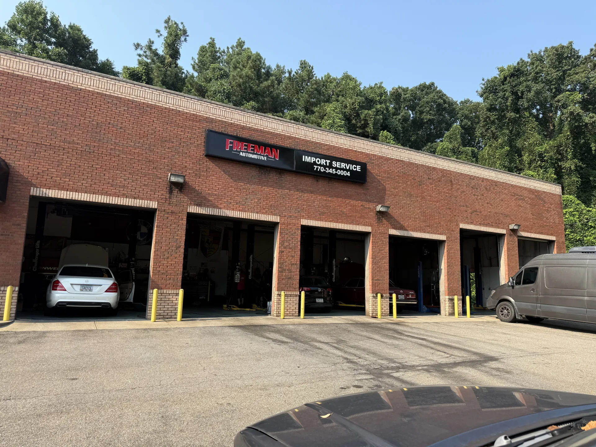 Freeman Automotive repair shop exterior at 12 Mill Street in Canton, Georgia